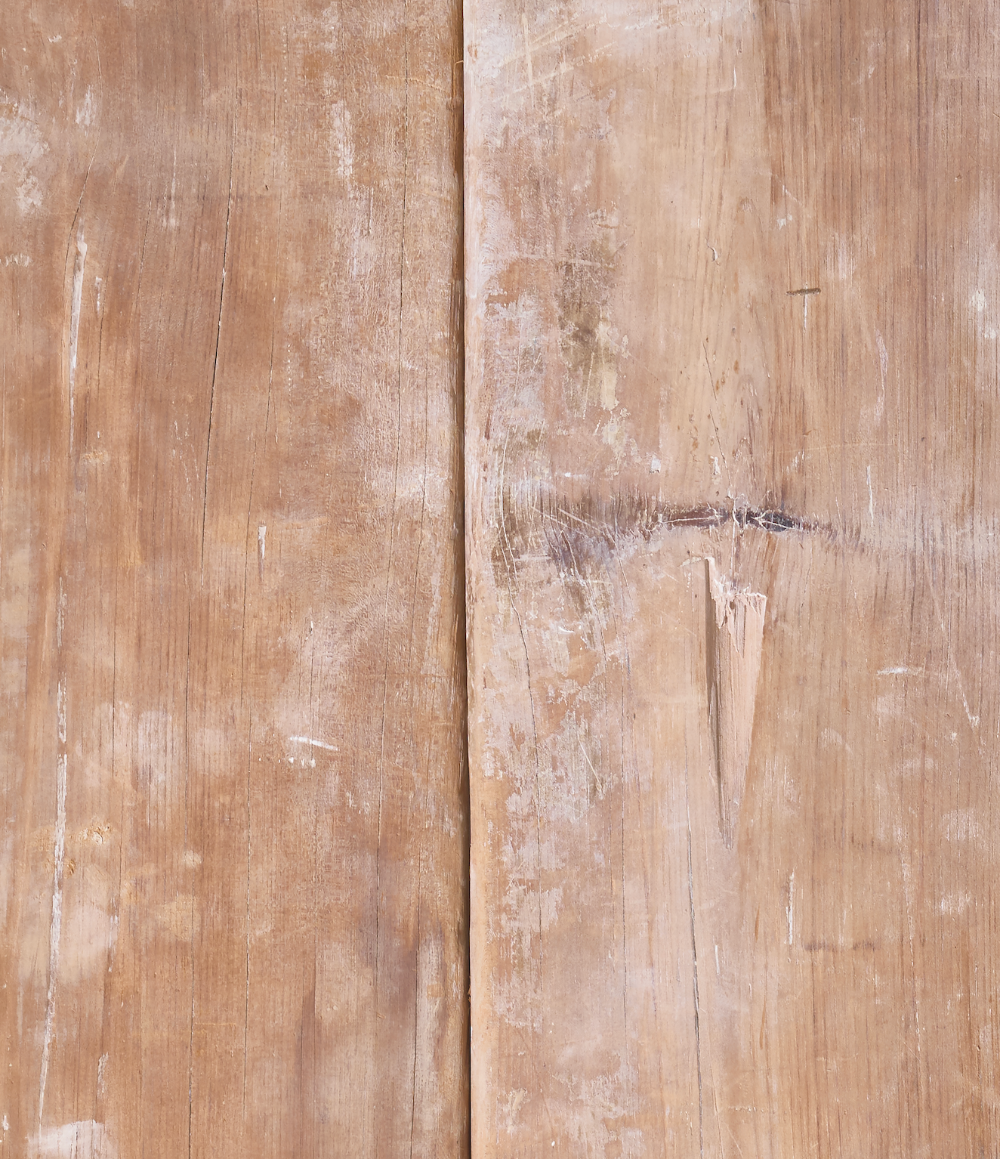 Close up of a vinyl photography backdrop captured from an antique wood board with visible wood grain, knots and cracks.