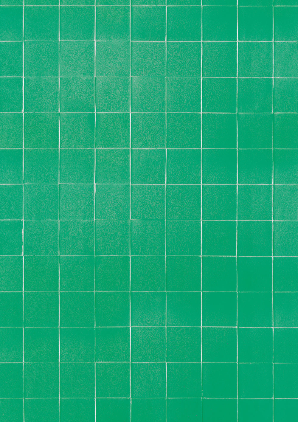 A crackled green vintage tile effect vinyl photography backdrop