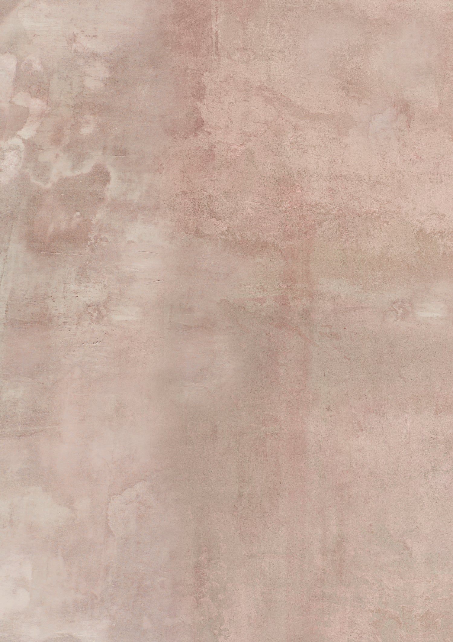 A close-up image of a beige-coloured vinyl photography backdrop captured from a bare plaster wall.