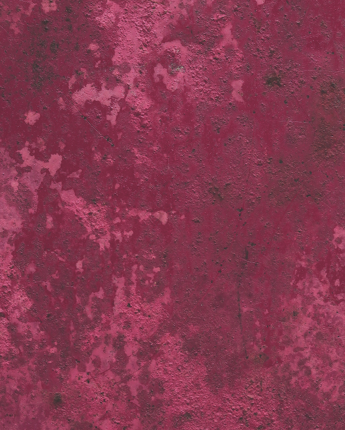close up of a textured deep pink paint effect photography backdrop.