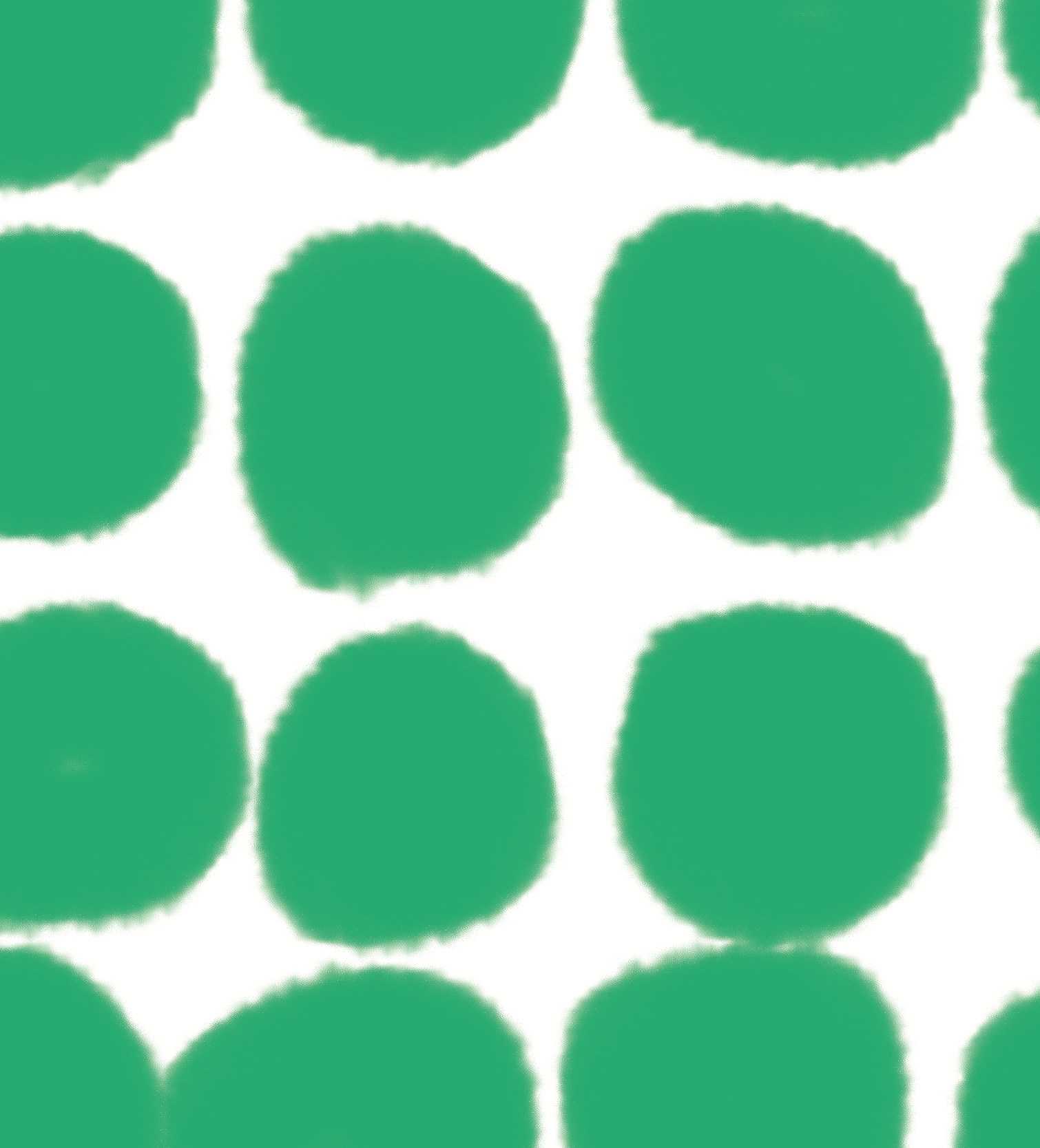 Close up of a bright green spotted vinyl photography backdrop for food and product styling.