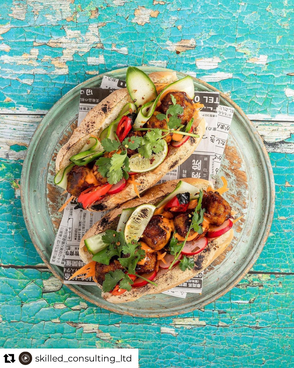 Bright flat lay of tacos styled with a turquoise and green coloured flaky wood effect vinyl photography backdrop, designed for food and product photography.