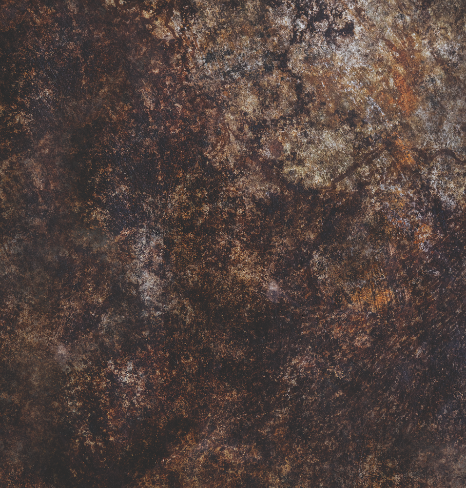 A mottled brown and rust photography backdrop with textured surfaces.