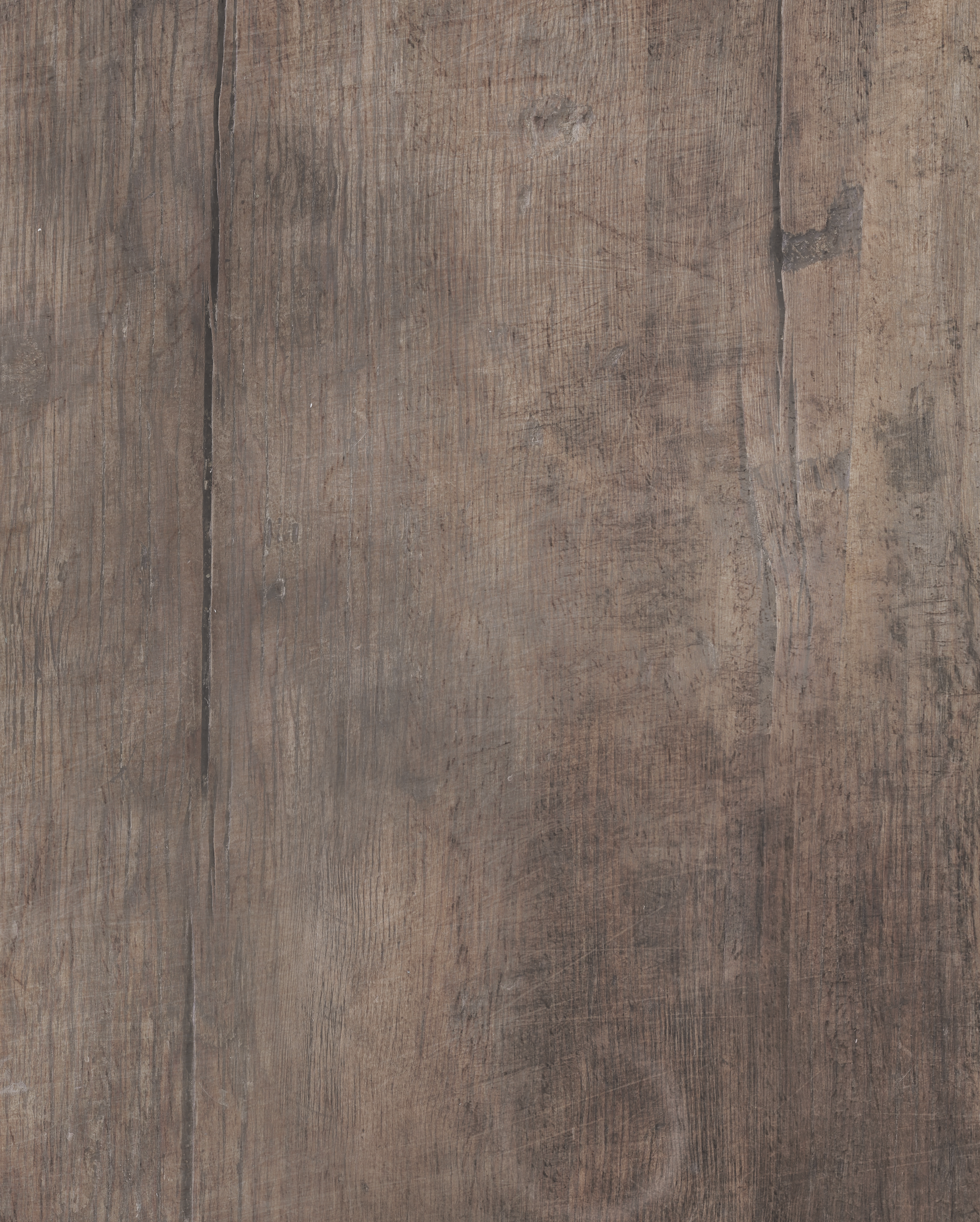 Close up of a dark wood table effect photography backdrop with a soft woodgrain effect.