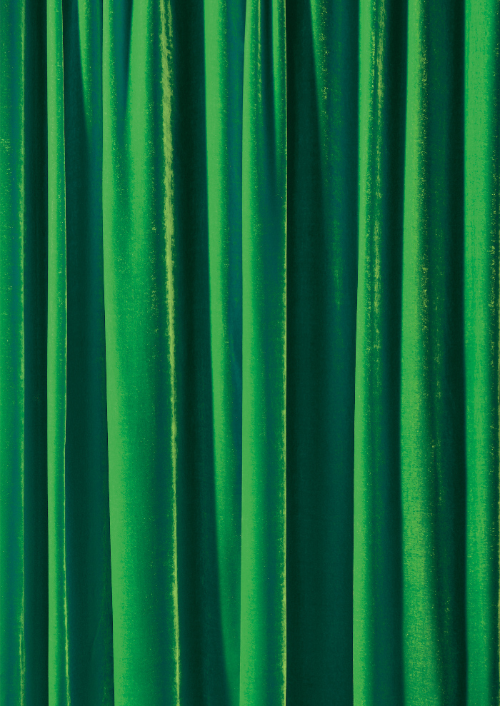 A grass green silk curtain-style vinyl photography backdrop ideal for drinks and product styling.
