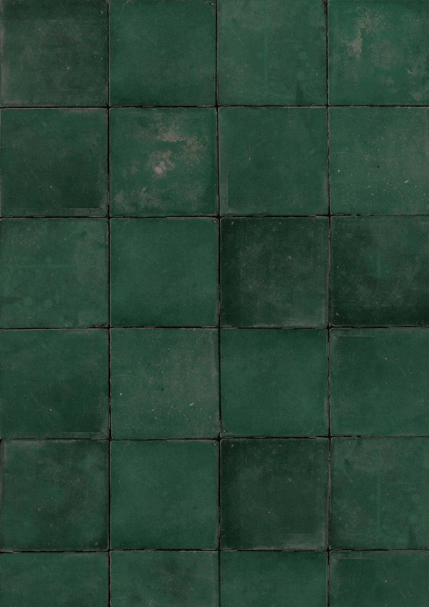 A close-up image of a green tile effect photography backdrop with an irregular patina.
