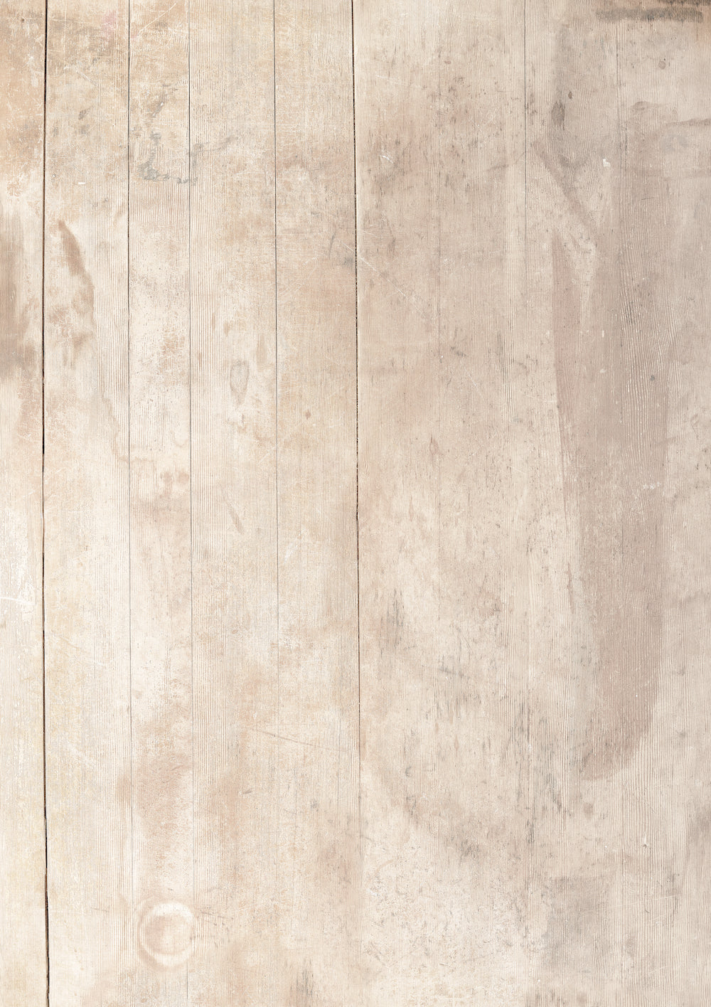 A photography backdrop featuring a faded light wood effect with vertical wood grain patterns.