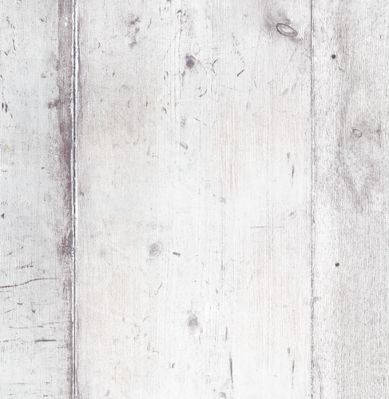 Close up of a white wood effect photography backdrop with vertical planks for food styling and product photography.