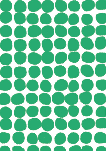 A bright green spotted vinyl photography backdrop for food and product styling.