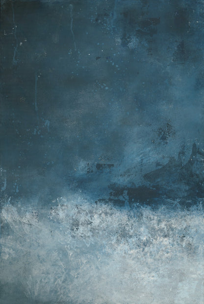 A vinyl photography backdrop with a gradient of deep blue to frothy white, creating a dramatic, artistic look.