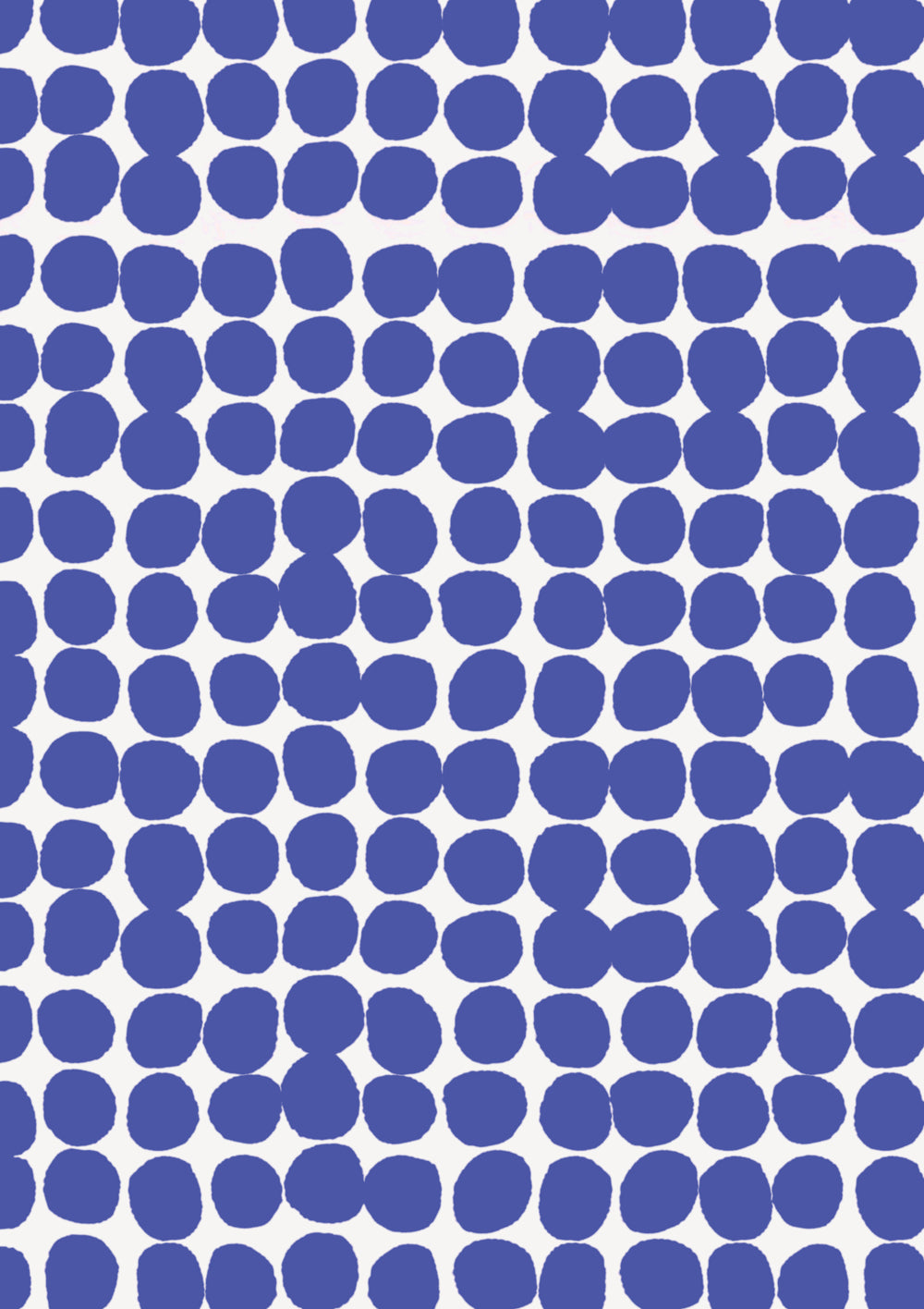 A blue and white vinyl photography backdrop with a hazy edged irregular spotted pattern across the surface, for food and product styling.