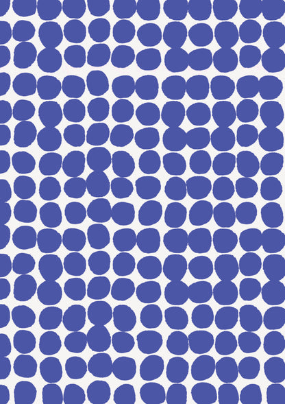 A blue and white vinyl photography backdrop with a hazy edged irregular spotted pattern across the surface, for food and product styling.