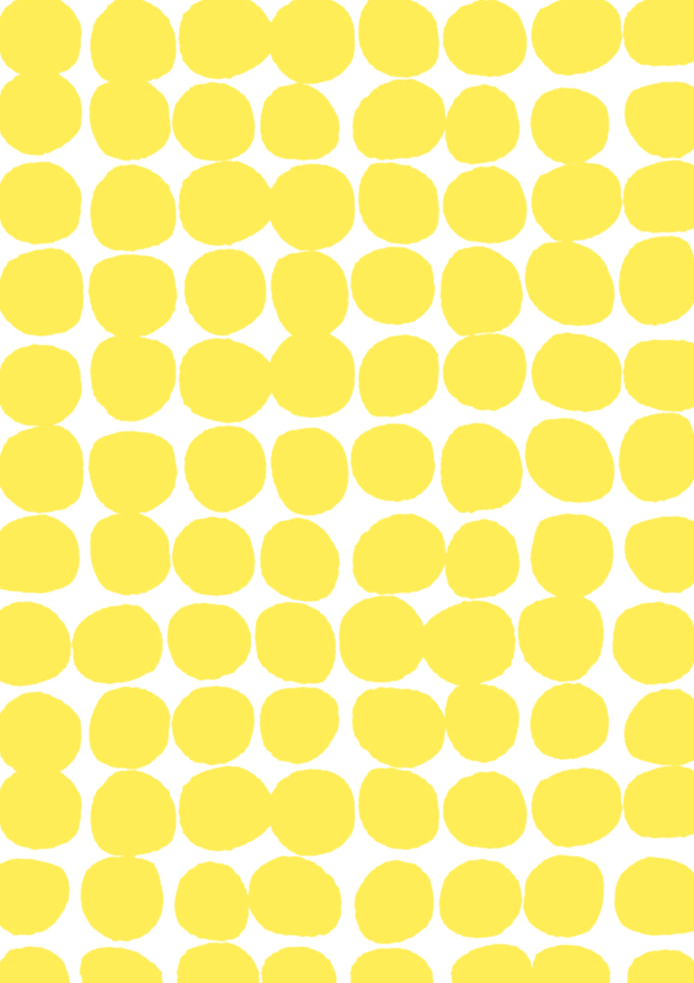 A yellow and white vinyl photography backdrop with a hazy edged irregular spotted pattern across the surface, for food and product styling.
