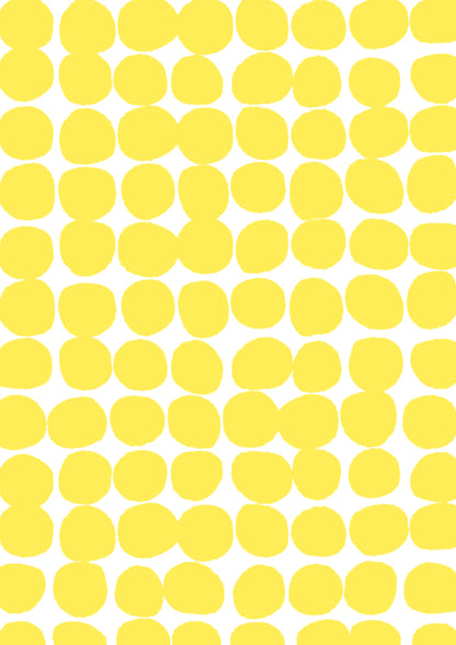 A yellow and white vinyl photography backdrop with a hazy edged irregular spotted pattern across the surface, for food and product styling.