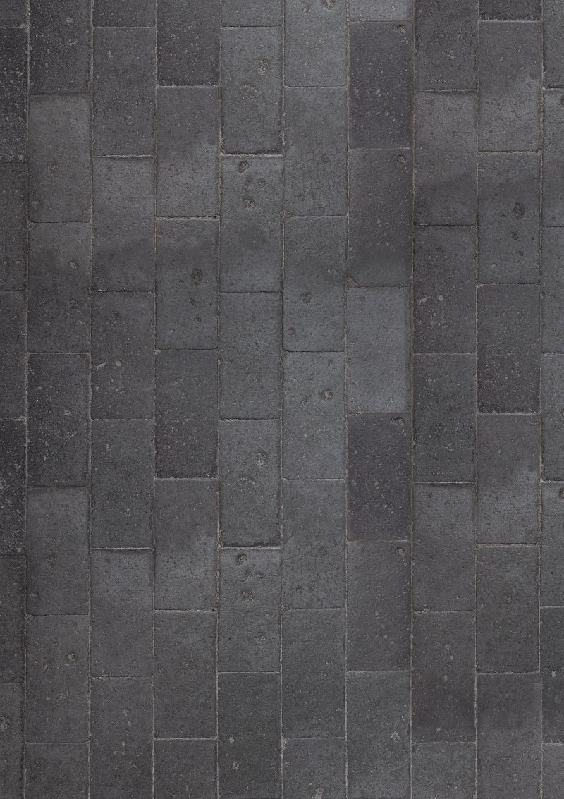 A vinyl photography backdrop captures from an old Victorian floor consisting of aged black and grey tiles with detailed grout lines.