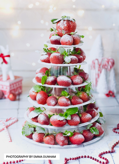 Strawberry tree on a light wood effect vinyl photography backdrop. Emma_Dunham_Photography