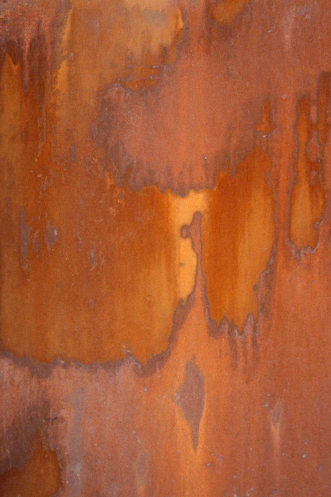 Vinyl photography backdrop for food and product styling with burnt orange, brown and copper tones captured from a real piece of metal.