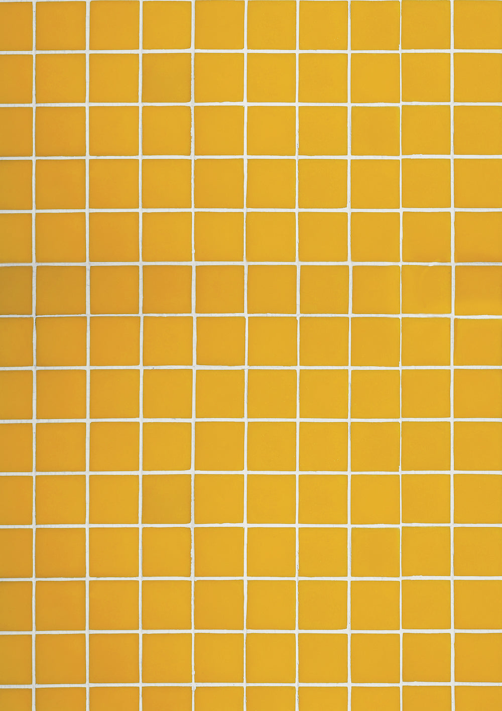 A close-up image of a yellow tile effect vinyl photography backdrop with white grout lines.