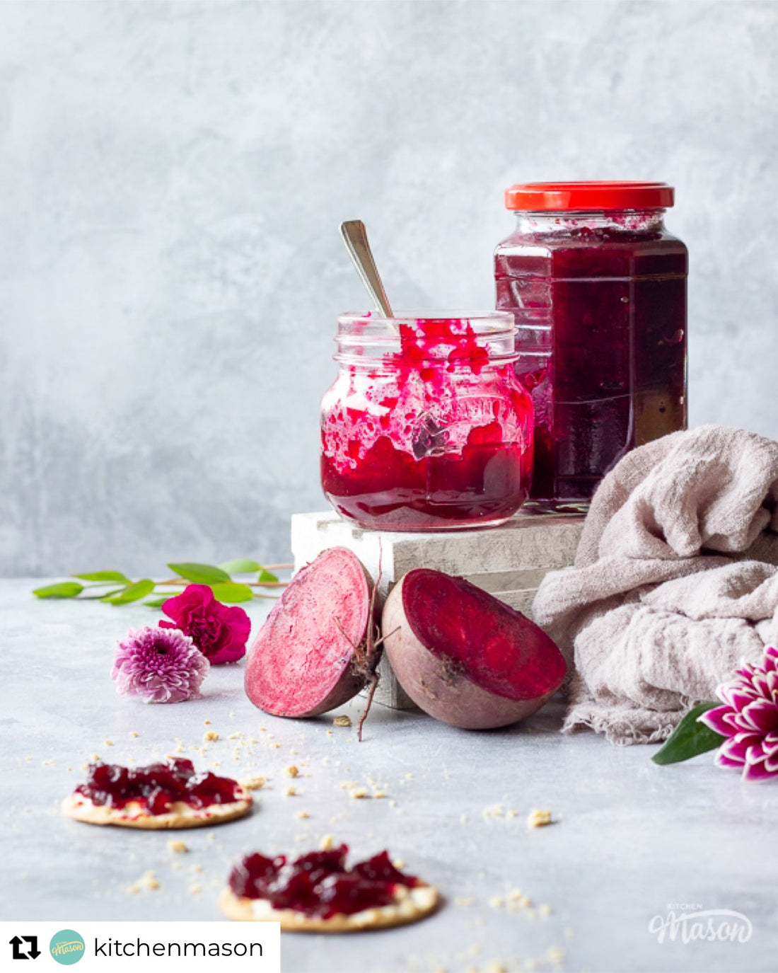 Beetroot chutney styled on a mid grey vinyl photography backdrop with a soft paint like texture.
