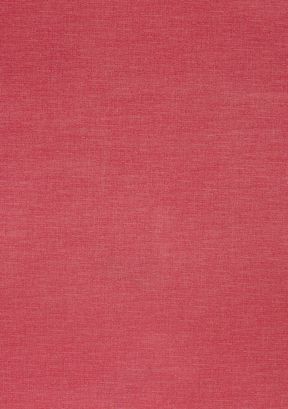 A solid red backdrop with a texture resembling a formica tabletop.