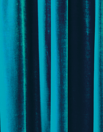 Close up of a peacock blue silk velvet curtain effect vinyl photography backdrop.