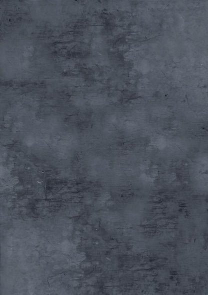 A close-up image of a vinyl photography backdrop showing a subtle, deep steely blue grey colour with a powdery finish.