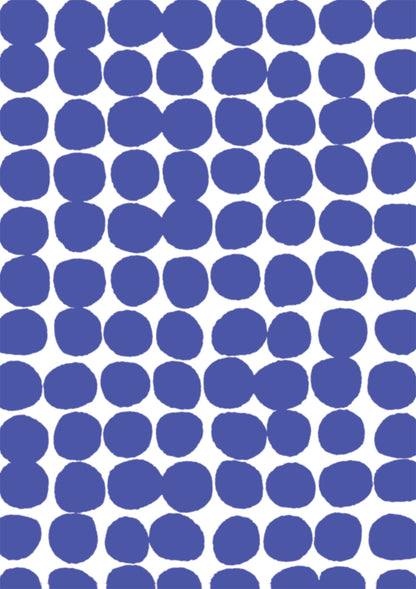 A blue and white vinyl photography backdrop with a hazy edged irregular spotted pattern across the surface, for food and product styling.
