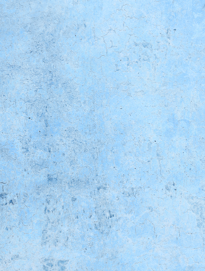 A close up of a pale blue vinyl photography backdrop with an old weathered chalky paint effect texture.