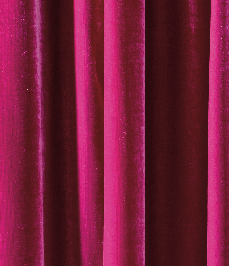 Close up of a vibrant pink curtain effect vinyl photography backdrop.