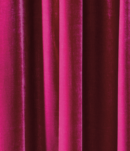 Close up of a vibrant pink curtain effect vinyl photography backdrop.