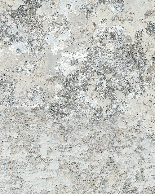 A close up of a concrete-effect photography backdrop with a textured grey surface and white cracks.