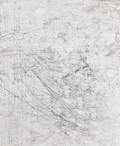 An abstract weathered white photography backdrop with grey flecks and scratches and a metal-esque patina.