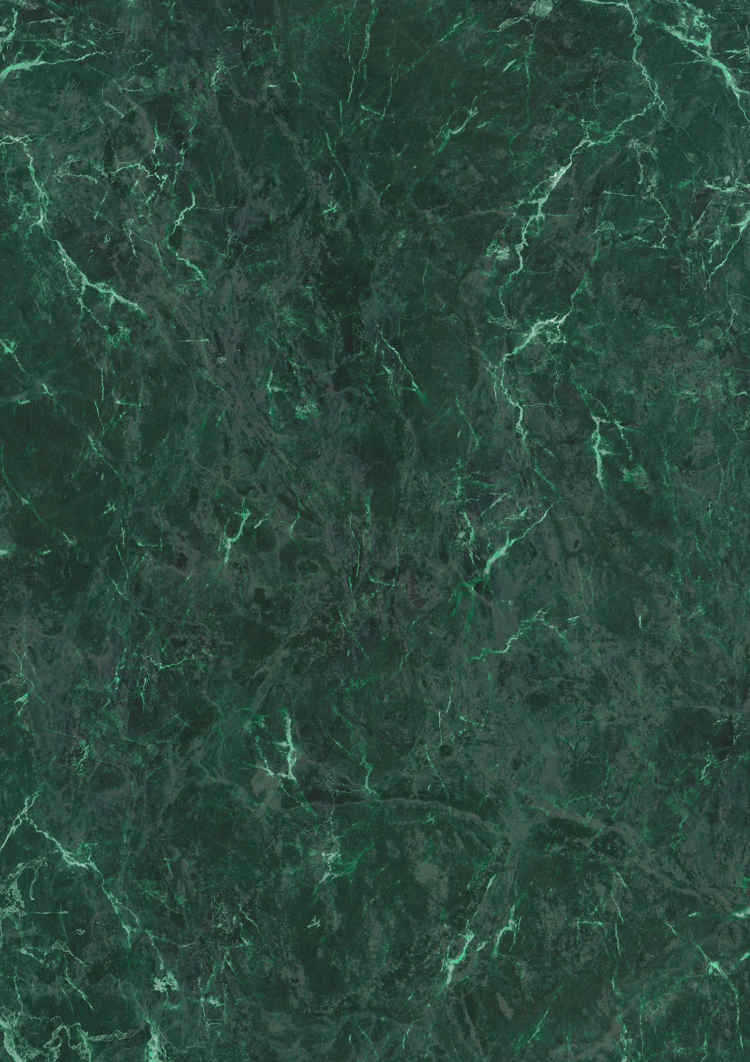 A close-up view of a green marble effect vinyl photography backdrop with areas of black, brown, and white, mimicking a natural stone pattern.