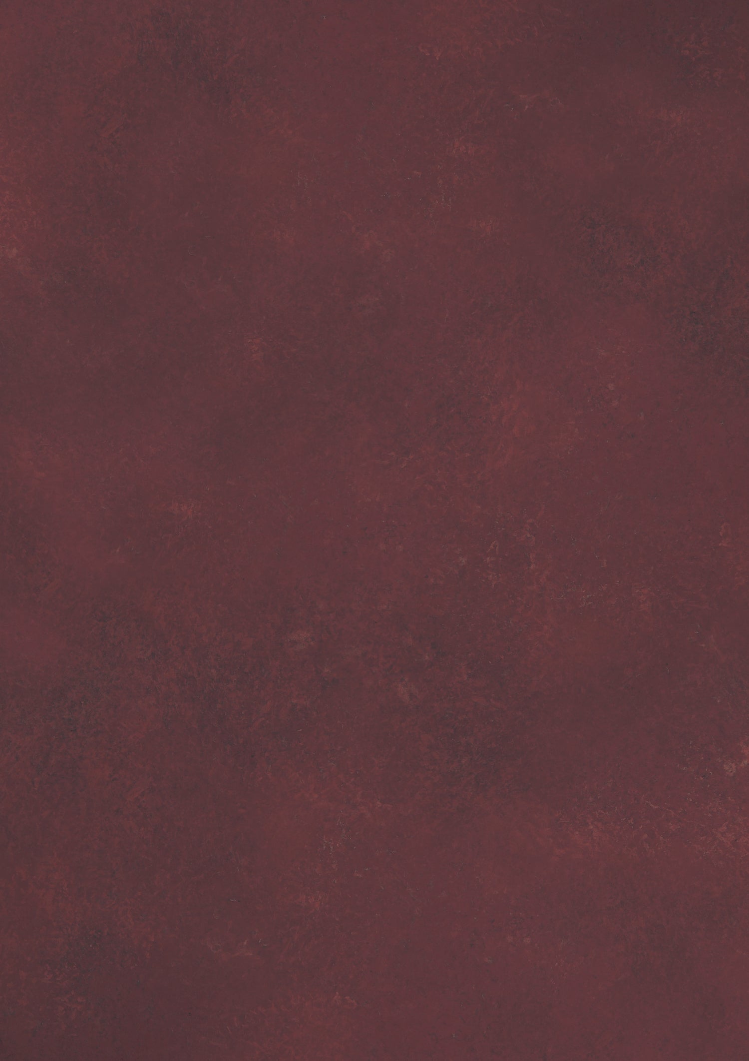 A close-up of a deep red vinyl photography backdrop used in food styling and product photography.