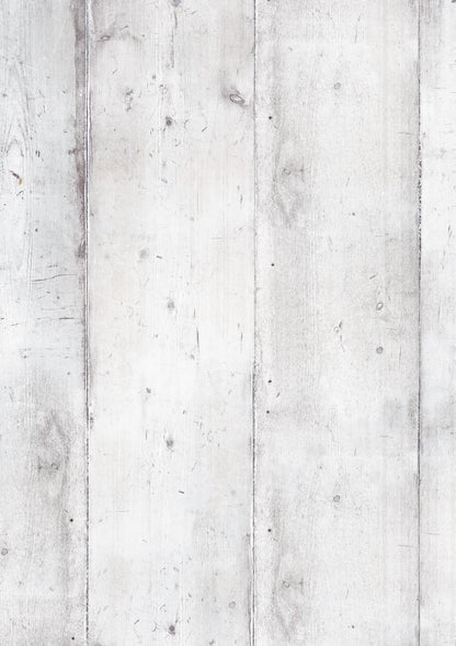 A white wood effect backdrop with vertical planks.