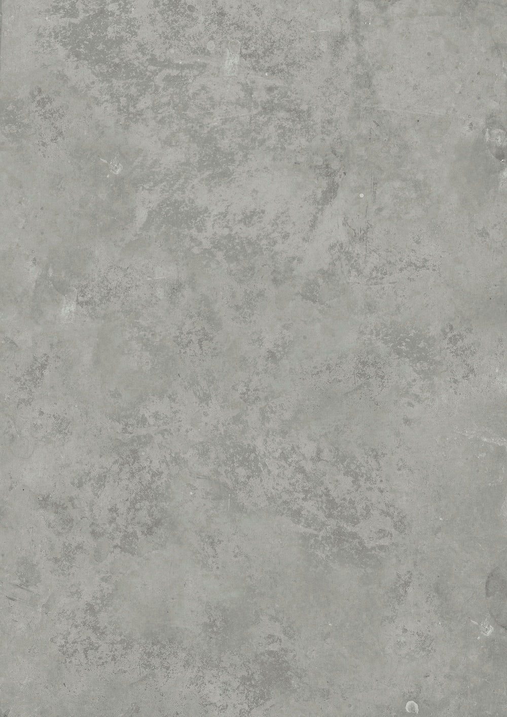 A close-up image of a concrete grey effect photography backdrop with a textured surface.