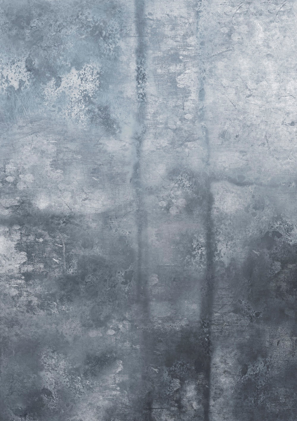 A grey textured photography backdrop with mottling and staining designed to resemble an aged zinc table surface, originally designed for cookbook cover photography.