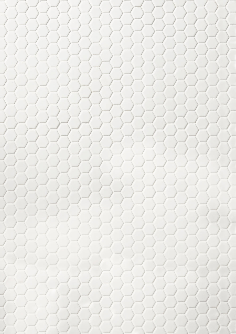 A white hexagonal tile-effect photography backdrop for food and product styling.