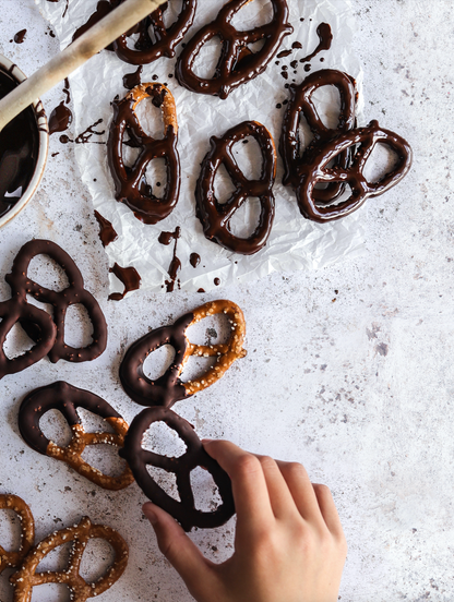 White vinyl food and product photography backdrop with chocolate pretzels