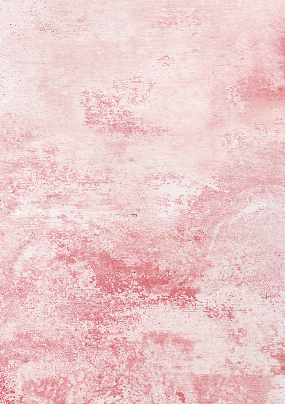 A pink wall effect photography backdrop with a washed, water-marked plaster texture and bar patches revealing sandy tones.