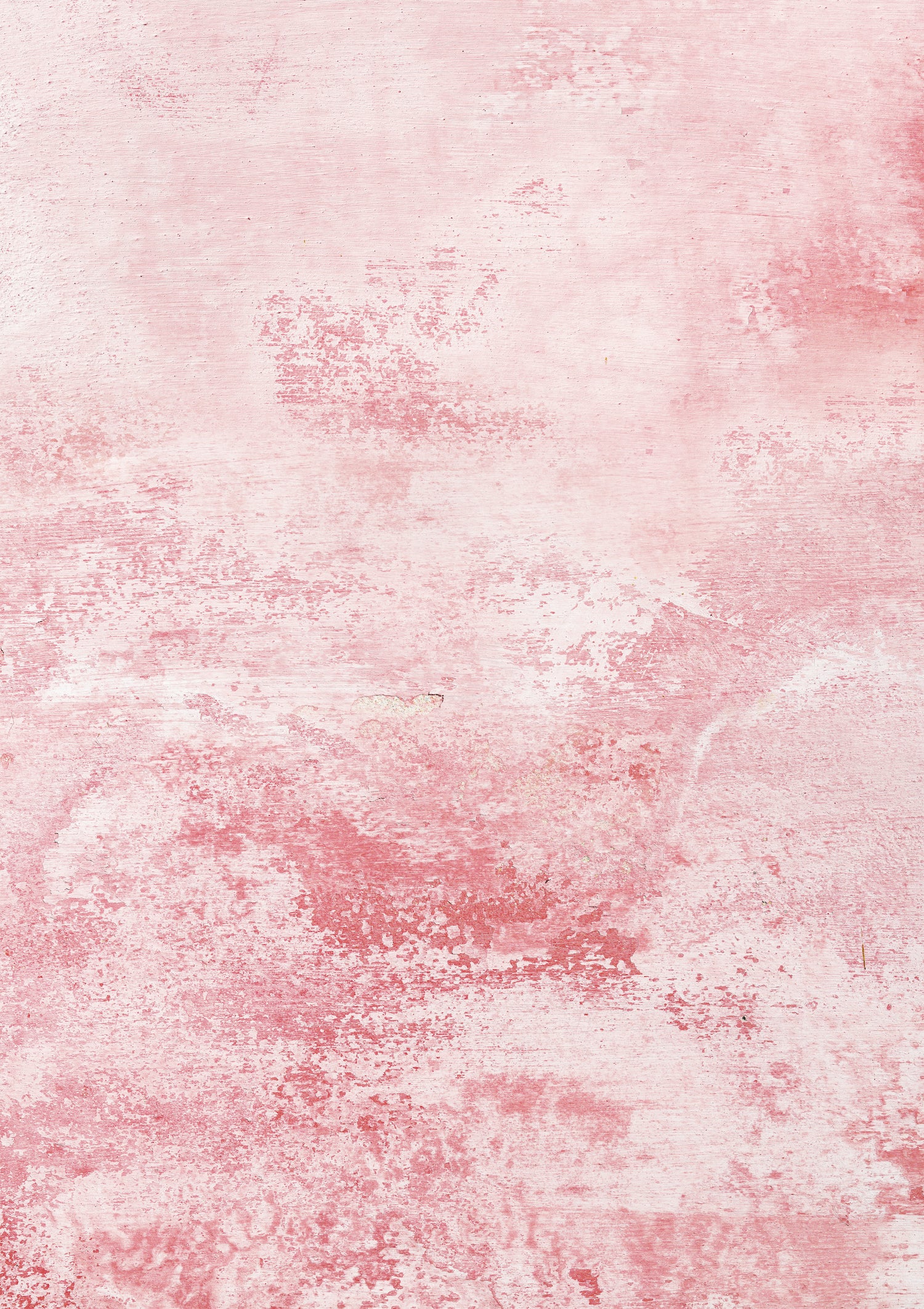 A pink wall effect photography backdrop with a washed, water-marked plaster texture and bar patches revealing sandy tones.
