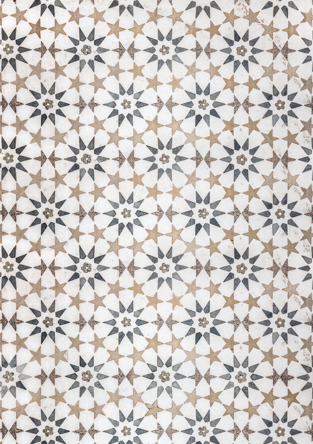 A photography backdrop with a geometric marble pattern in beige, brown, and white tones.