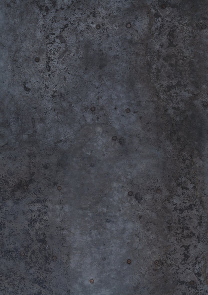 A dark grey metal patina effect photography backdrop with a textured surface featuring original circular rivets.